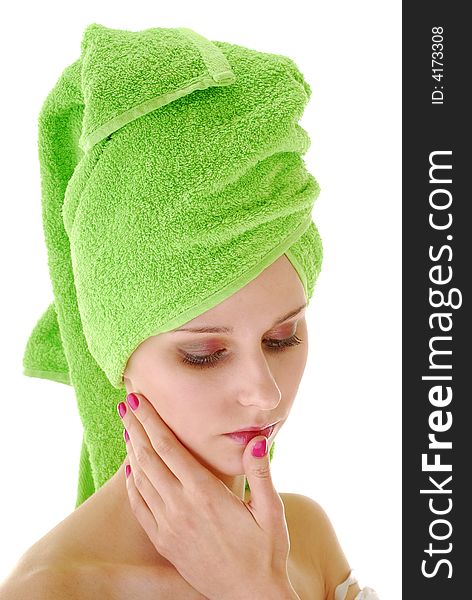 Young woman with green towel on her head. Young woman with green towel on her head
