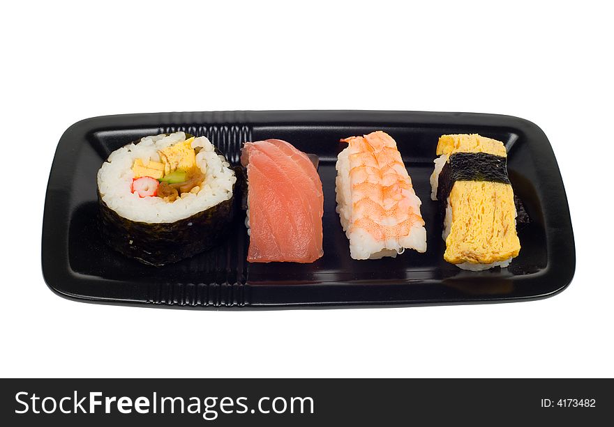 Assortment of sushi on a plate,  isolated on a white backgroud