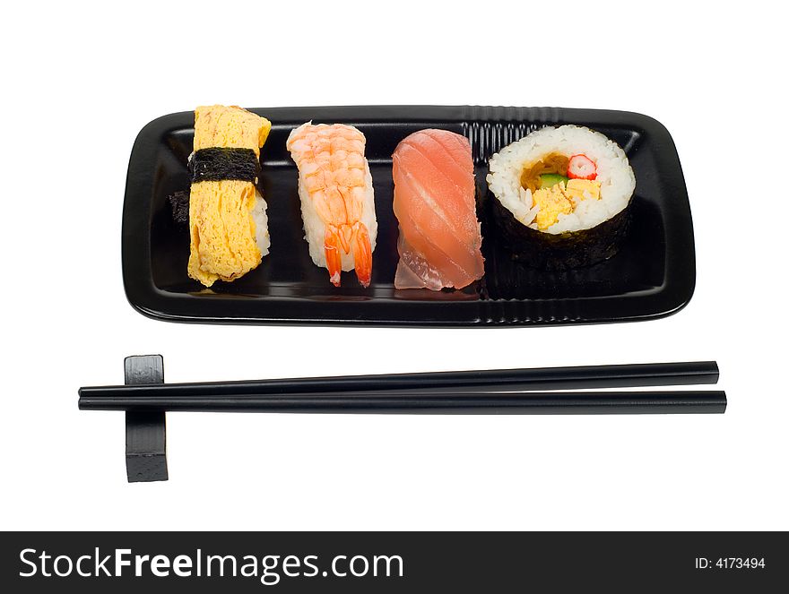 Assortment of sushi on a plate,  isolated on a white backgroud