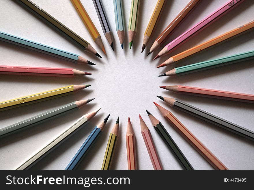 24 pcs Color Pencils Arrangement Pointing To A Center Of A Circle. 24 pcs Color Pencils Arrangement Pointing To A Center Of A Circle