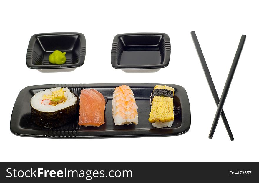 Assortment of sushi on a plate,  isolated on a white backgroud