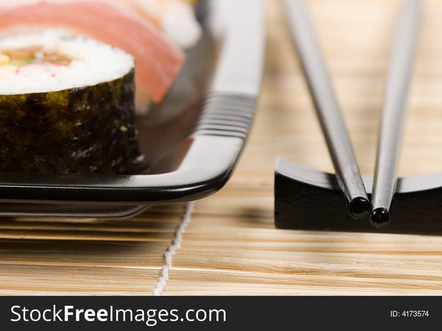 Assortment of sushi on a bamboo mat