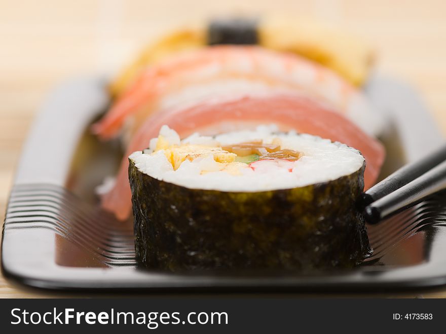 Assortment of sushi on a bamboo mat