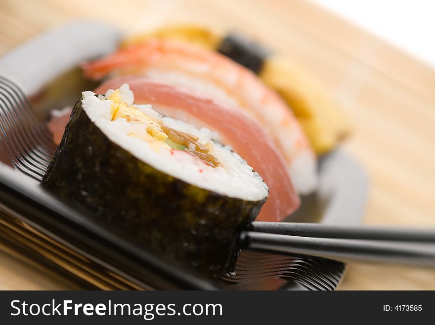 Assortment of sushi on a bamboo mat