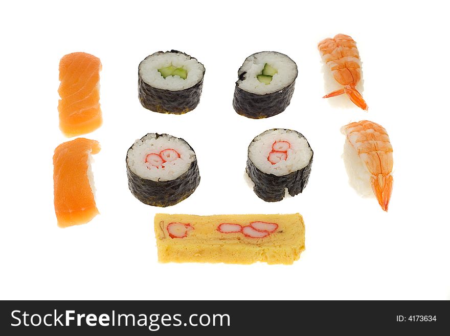 Assortment of fresh sushi pieces isolated on a white background. Assortment of fresh sushi pieces isolated on a white background