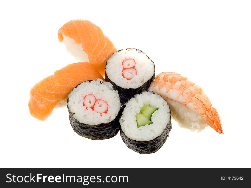 Assortment of fresh sushi pieces isolated on a white background. Assortment of fresh sushi pieces isolated on a white background