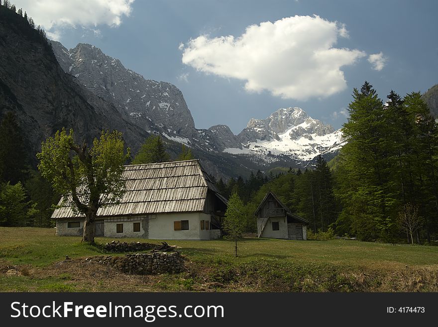 Alpine countryside with old cottage. Alpine countryside with old cottage.