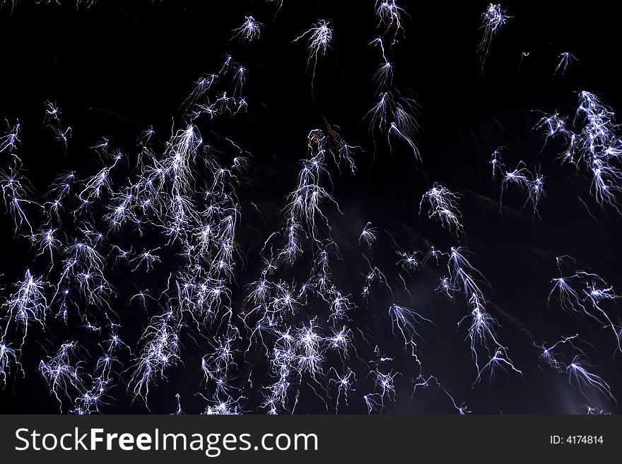 Black background with beautiful colored fireworks. Black background with beautiful colored fireworks