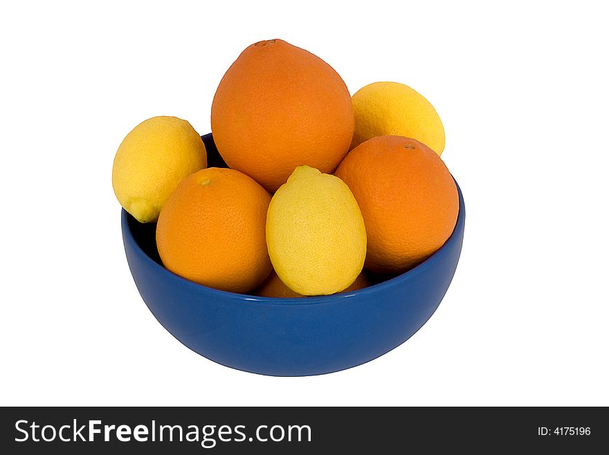 Bowl of oranges and lemons isolated on white