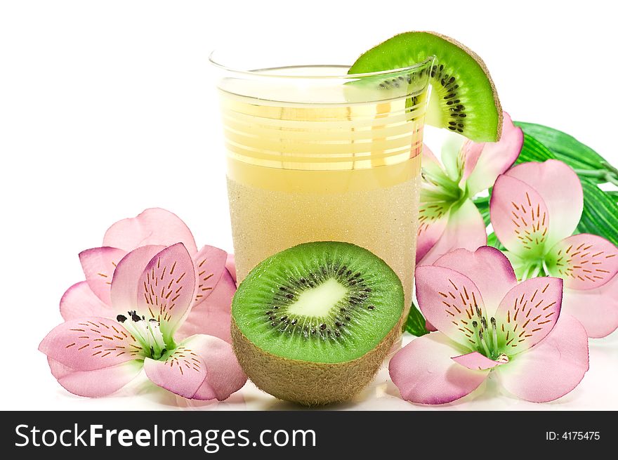 Kiwi juice and decorations on white background