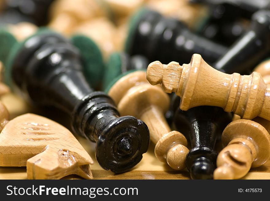 A pile of chess pieces close up