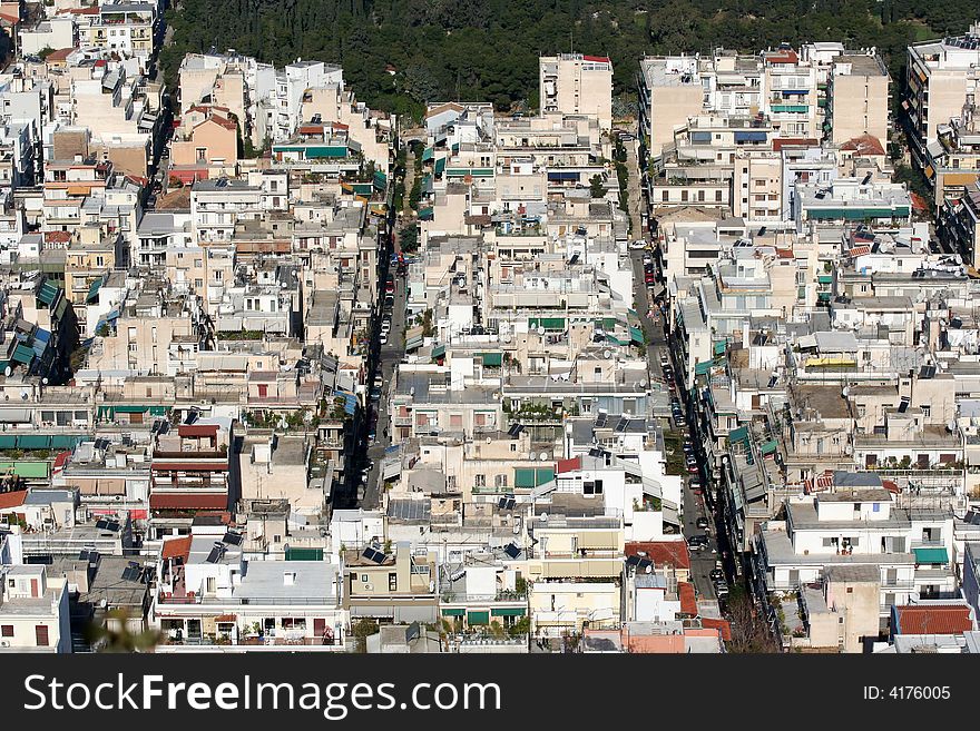 A view of a densely populated area of the city of Athens, Greece, from a hill top. A view of a densely populated area of the city of Athens, Greece, from a hill top