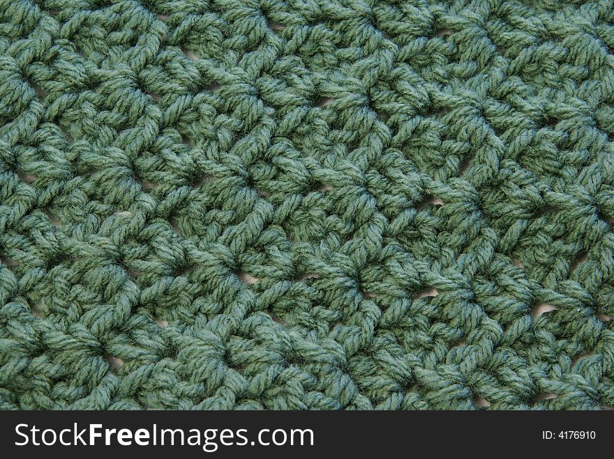 Close up of crochet pattern texture for use as background or design elements. Close up of crochet pattern texture for use as background or design elements.