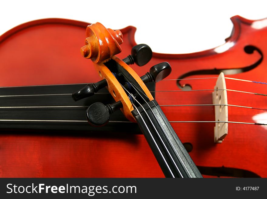 Two violins isolated on a white background. A fragment