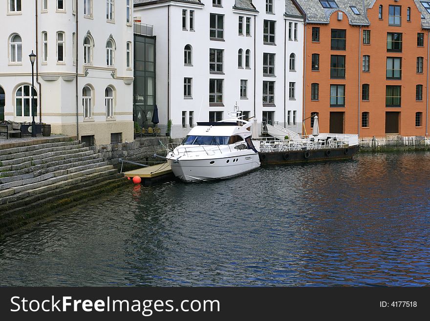 Alesund is a seaport, boat in the city