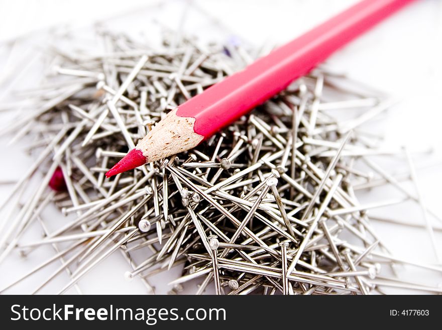 Sharp Red Pencil On Pins