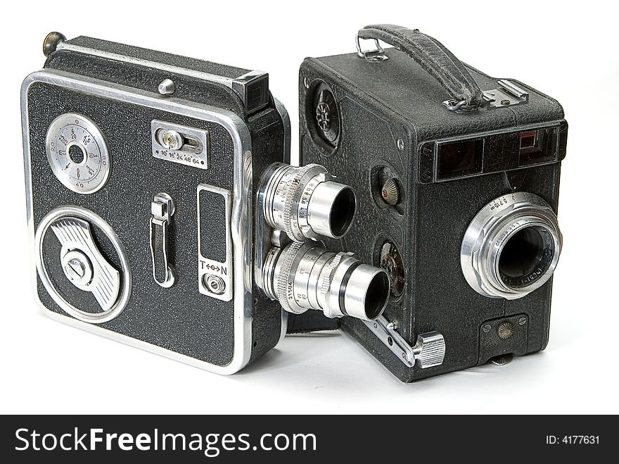 Isolated two retro hand cameras for amateur film