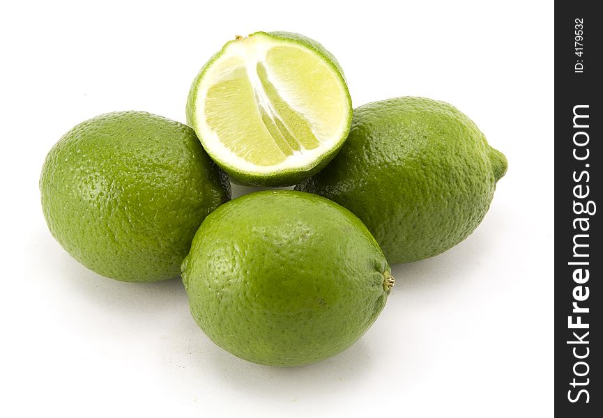 Group of Whole Limes with Halved Lime Isolated on White Background.