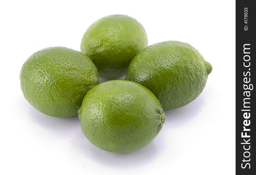 Group of Whole Limes with Halved Lime Isolated on White Background.