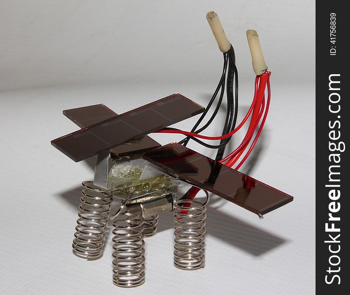 Hand made electric bug on the solar batteryes standing on springs
