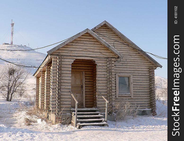 Russian wooden small house in the winter. Russian wooden small house in the winter