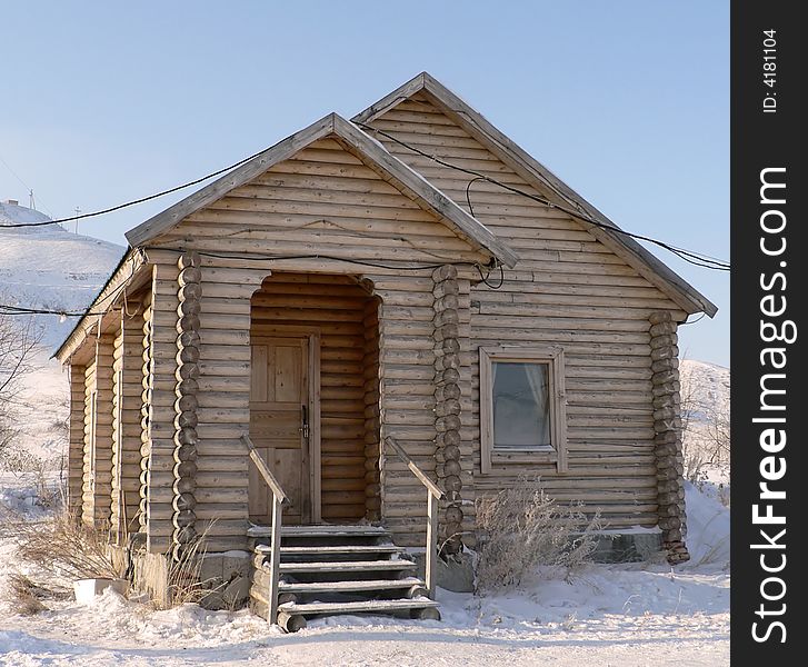 Russian wooden small house in the winter. Russian wooden small house in the winter