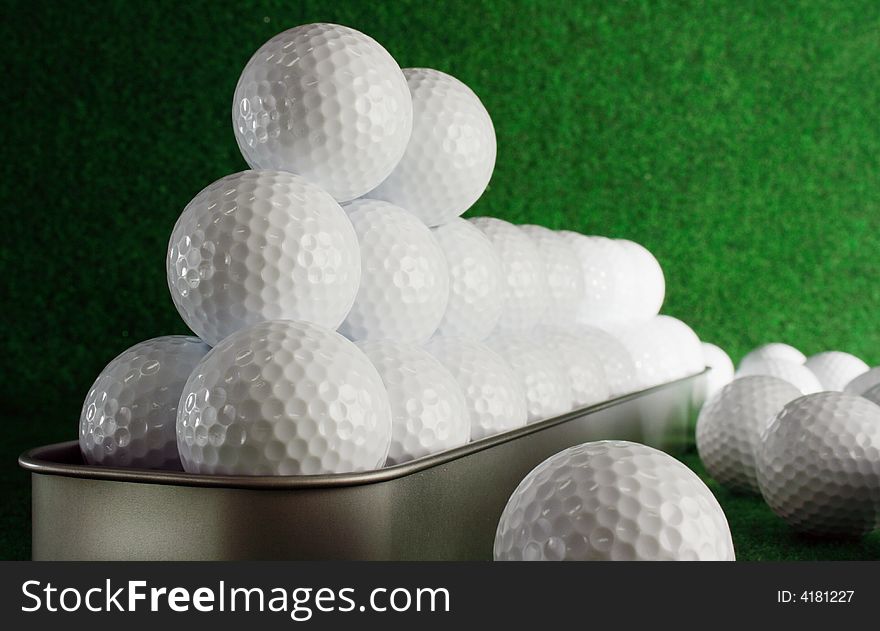 Golfballs waiting for a very long ride