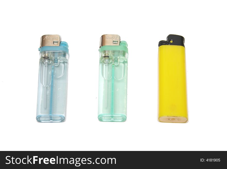 Three lighters isolated on the white ground