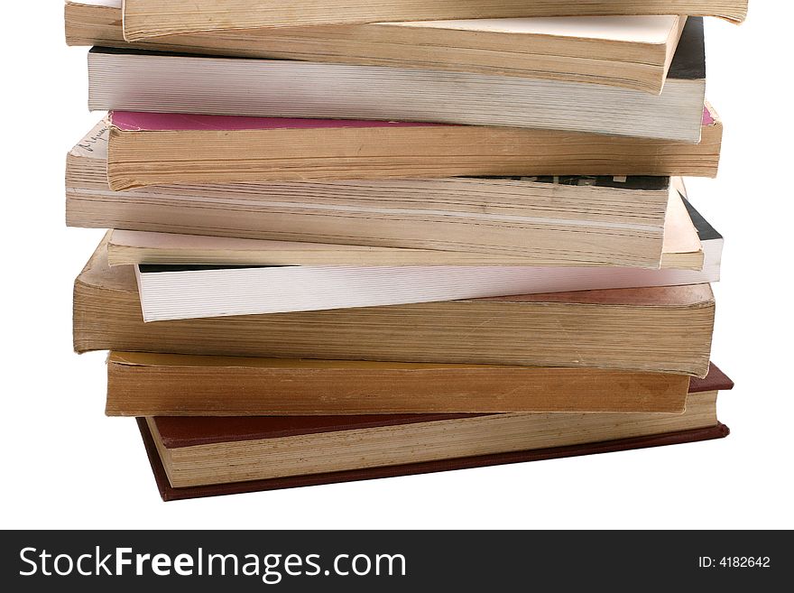 Stack of old books isolated on white