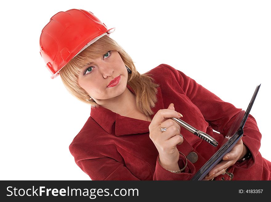 A woman in a helmet keeping a notebook with a pen. A woman in a helmet keeping a notebook with a pen