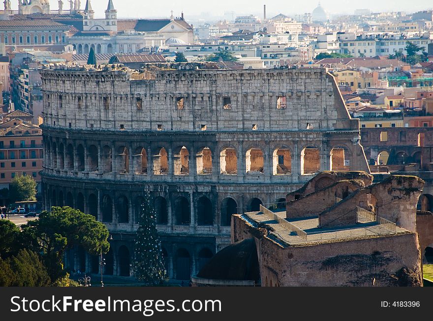 Colosseum landmark from above in city setting. Colosseum landmark from above in city setting