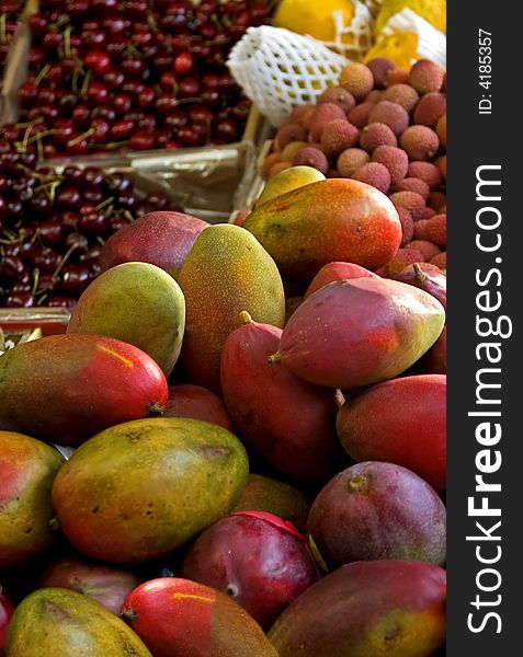 Fresh mangoes and other fruit in a street market