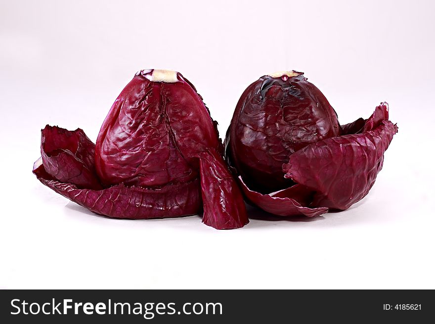 Two red cabbage  on a white background. Two red cabbage  on a white background