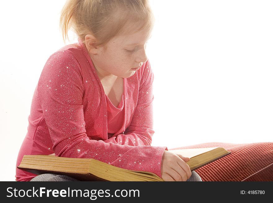 Little Girl Is Reading A Book