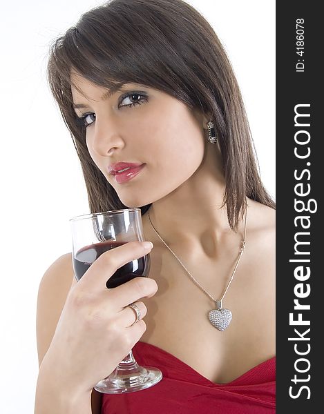 Pretty girl in red dress drinking wine. Pretty girl in red dress drinking wine