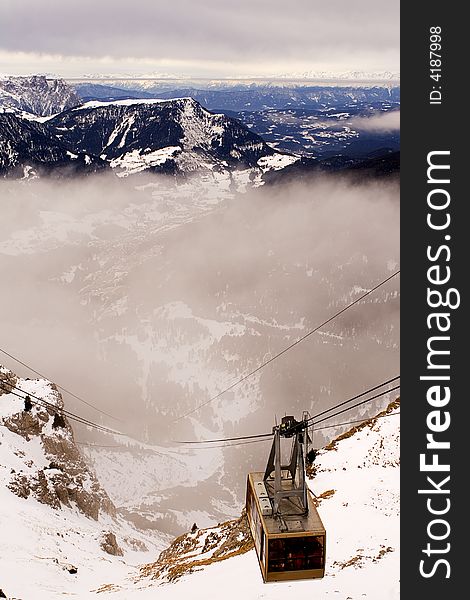 A large gondola cable car in the Dolomites, Italy. A large gondola cable car in the Dolomites, Italy.