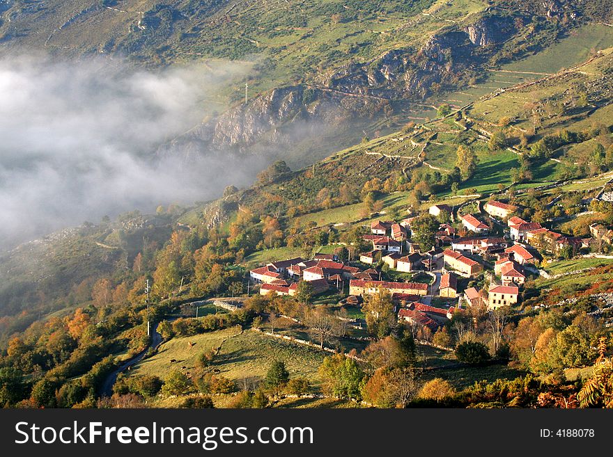 Fog arriving to small village. Fog arriving to small village