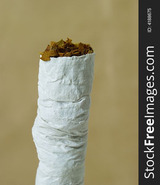 Close picture of clutched cigarette. Close picture of clutched cigarette