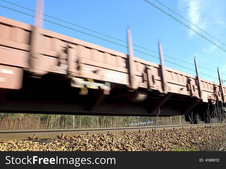 Fast moving cargo train with stock in Europe. Fast moving cargo train with stock in Europe