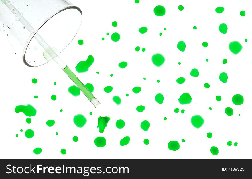 Pattern of glass of green water spilled on white. Pattern of glass of green water spilled on white