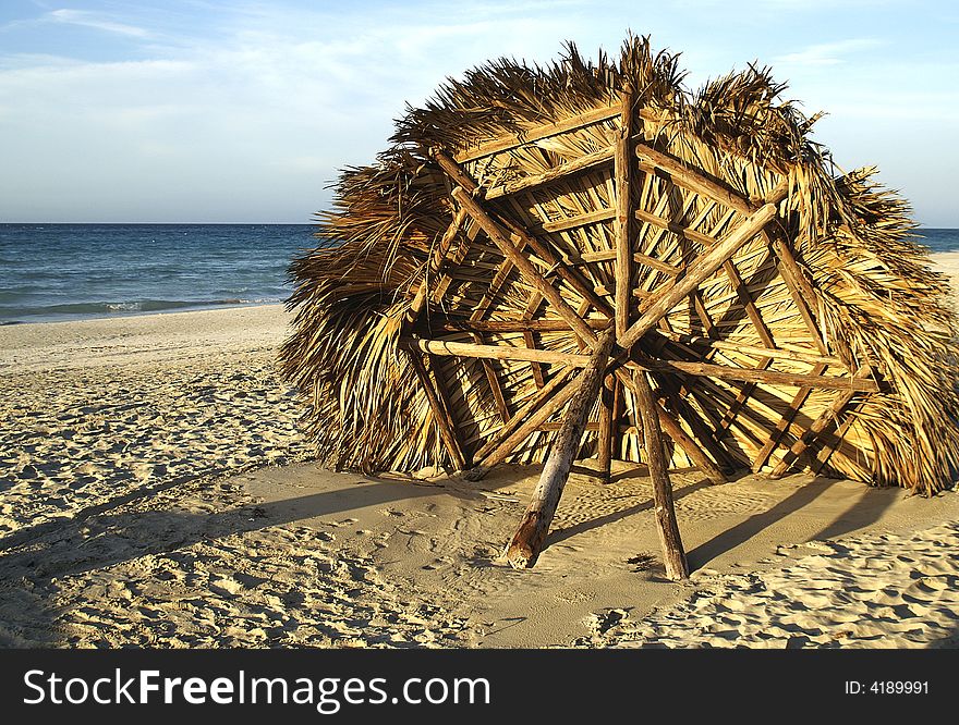 Cabana stuck in sand on beach. Cabana stuck in sand on beach