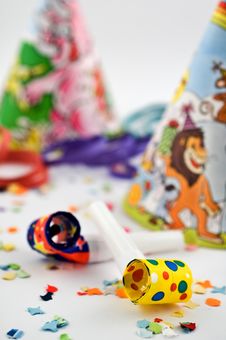 Party Blowers With Party Hats And Confetti Royalty Free Stock Photos