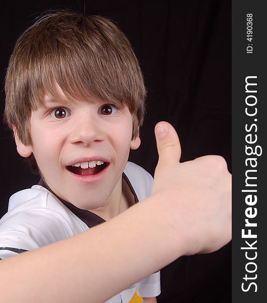 This boy is happy! Did his team win? What's he trying to say here? You decide. This boy is happy! Did his team win? What's he trying to say here? You decide...