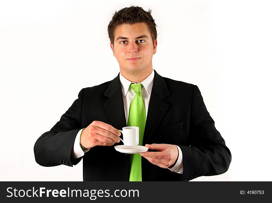 Young businessman with cup of coffe over white background. Young businessman with cup of coffe over white background