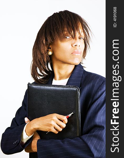 Business woman with portfolio and red pen in hands