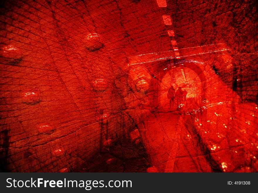 Composite abstract of people in tunnel overlaid with texture pattern