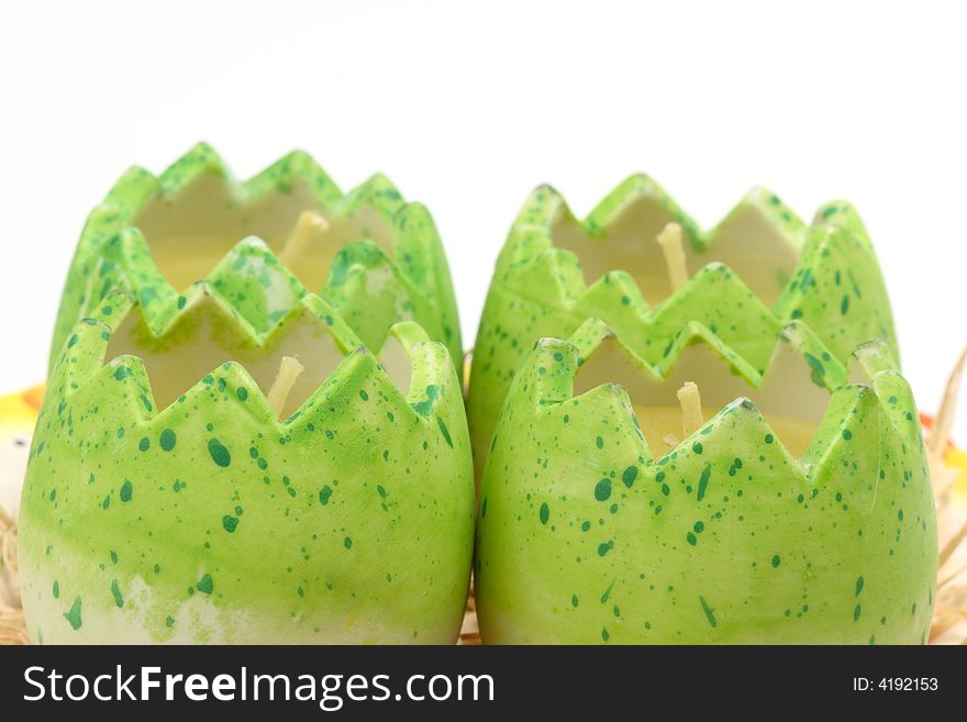 Easter candles - four green eggs. Easter candles - four green eggs