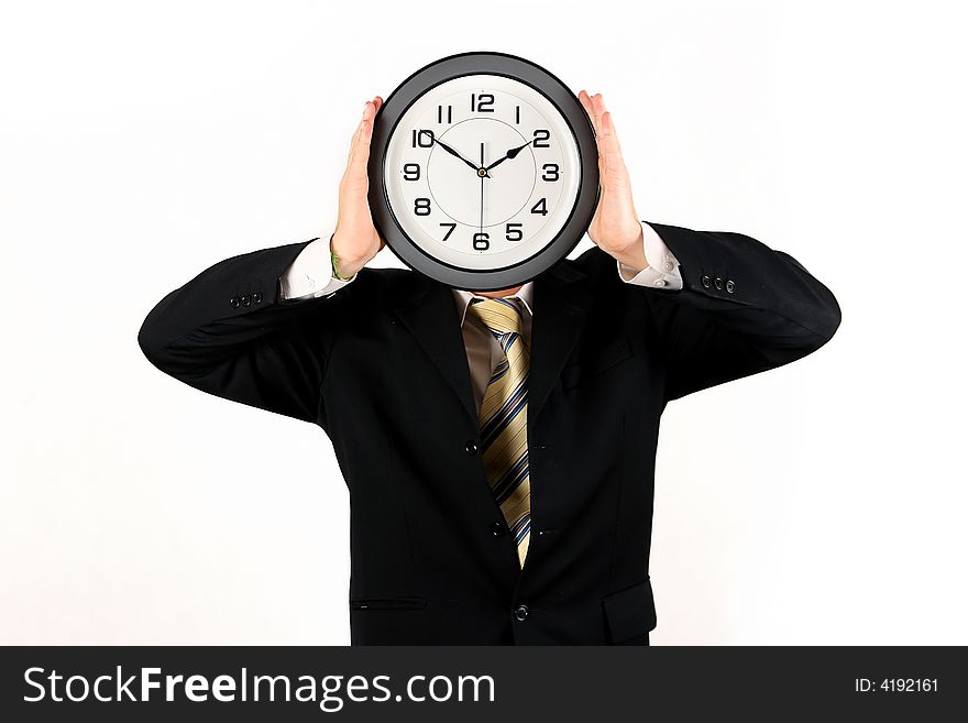 Young businessman with clock over white background
