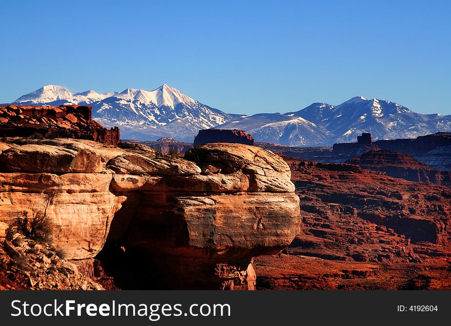 View of the red rock formations in Canyonlands National Park with blue skyï¿½s. View of the red rock formations in Canyonlands National Park with blue skyï¿½s