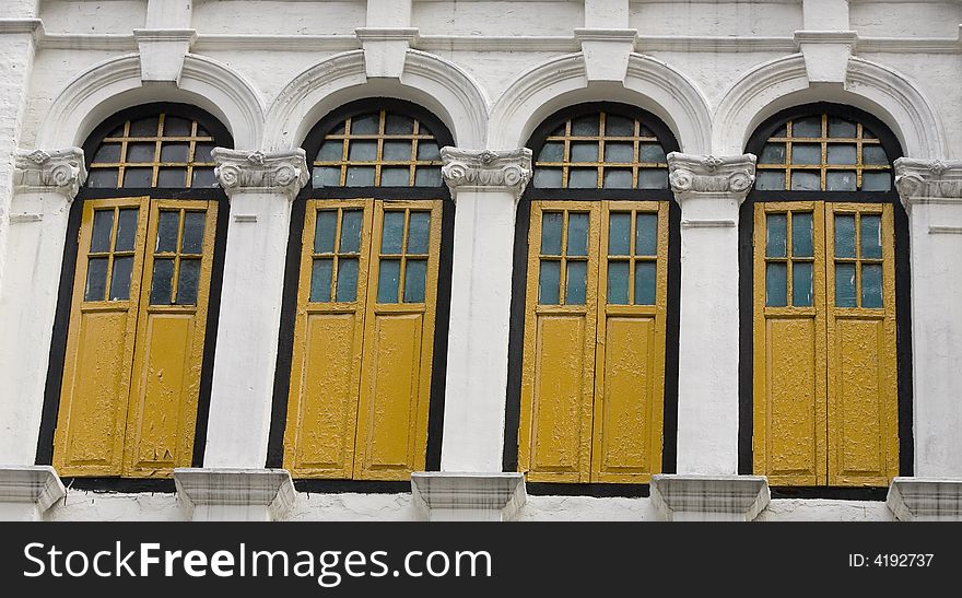 Windows of old colonial building. Windows of old colonial building